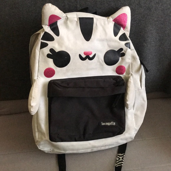 white cat backpack